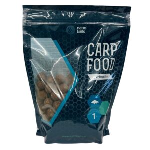 Obrazek przedstawia kulki zanętowe w torbie z okienkiem o wadze 1kg. Kulki są o smaku morwa-łosoś.